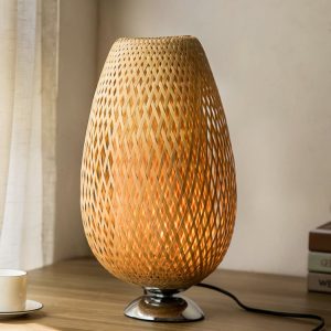 Lampe de chevet ovale en rotin socle métal