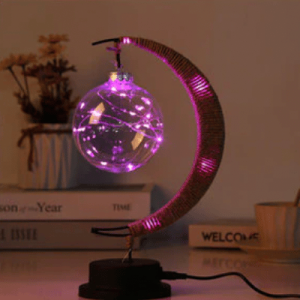 Lampe en rotin en forme de lune rose